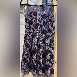 Francesca’s purple floral knee-length dress!